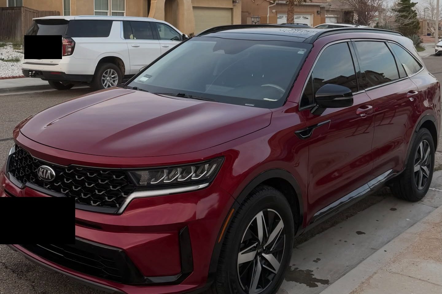 A detailed vehicle parked on a residential Victorville driveway